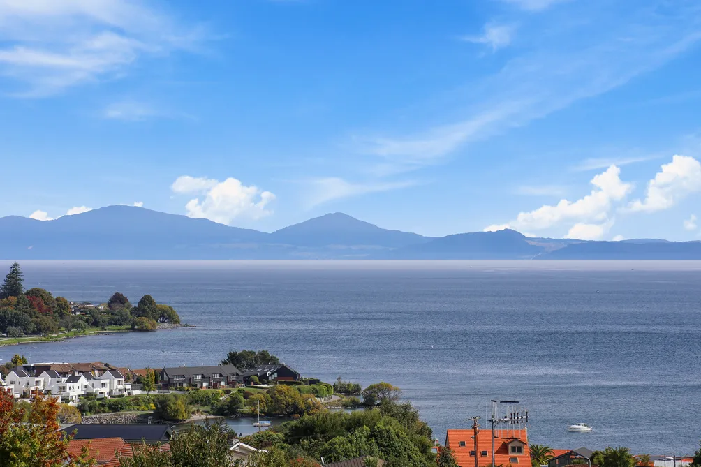 Panoramic Views Of Lake, Mountains And Beyond