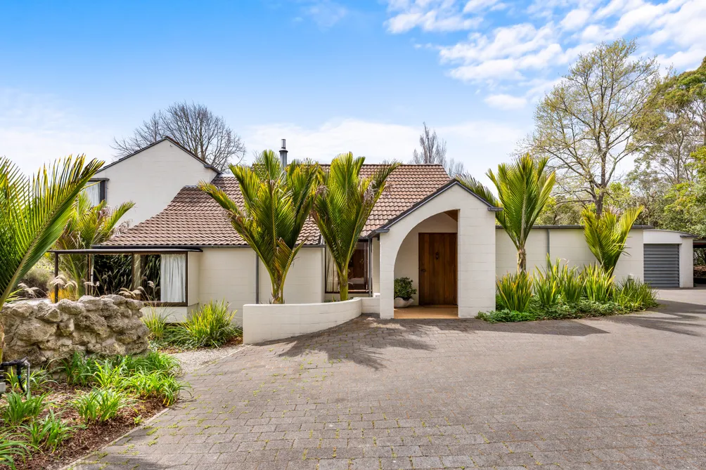 Timeless John Scott Home in Coveted Location