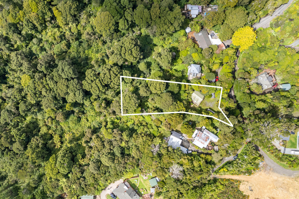 Bush-Clad Section with Spacious Garage and Loft