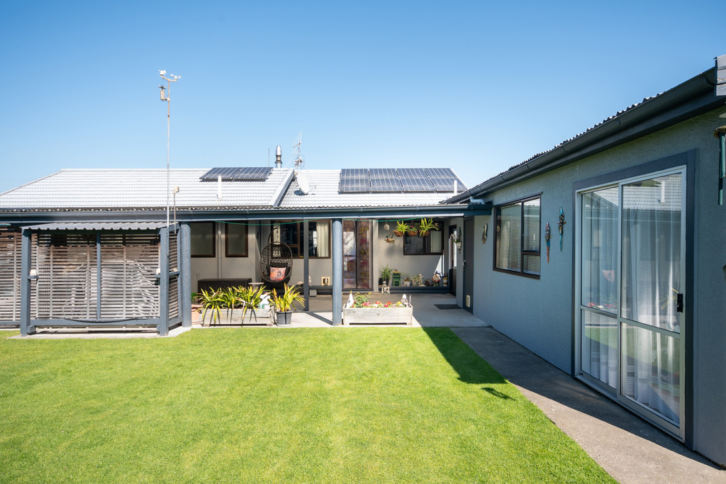 Immaculate Gem with Large Garage and Shedding
