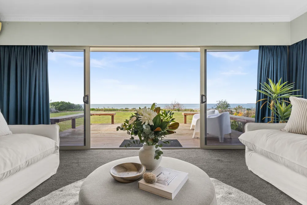 Absolute Beachfront Living with Potential