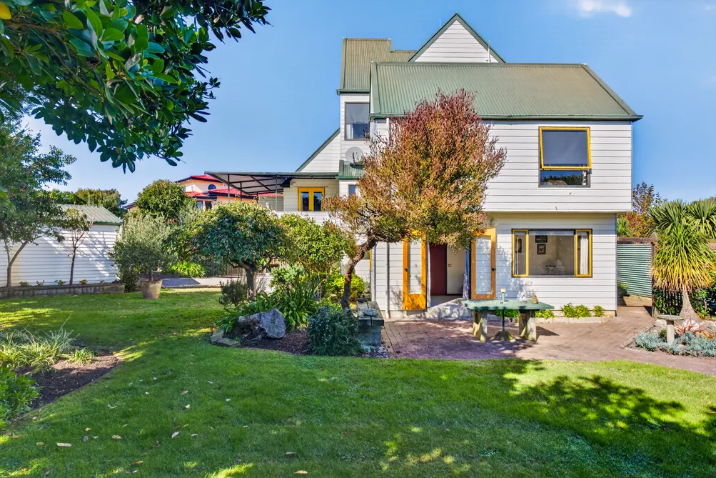 Architectural Coastal Living with Garaging