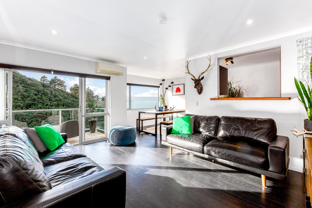 A Rare Gem – Style, Sun and Sea Views!